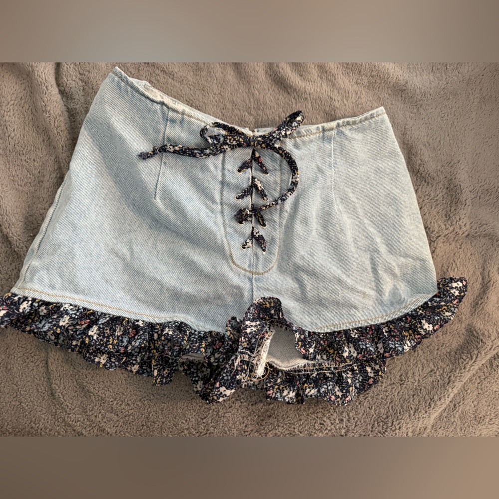 Paris Blues Vintage Light Blue Denim Shorts With Tie Waist and Ruffle Edge